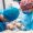 dental-clinic-women-dentists-in-blue-suits-and-ha-2024-12-09-04-09-24-utc (1)