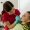pediatric-dentist-showing-little-boy-in-chair-the-2023-11-27-05-30-42-utc (1)